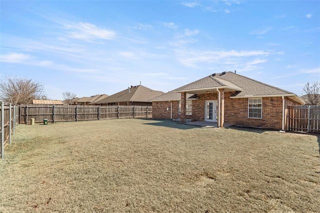 exterior space with a fenced backyard