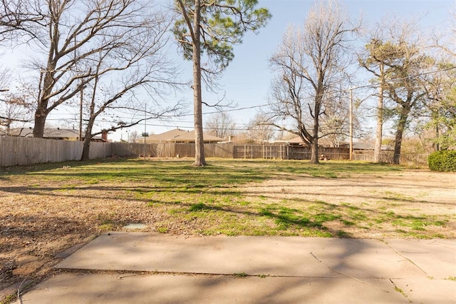 view of yard with a fenced backyard