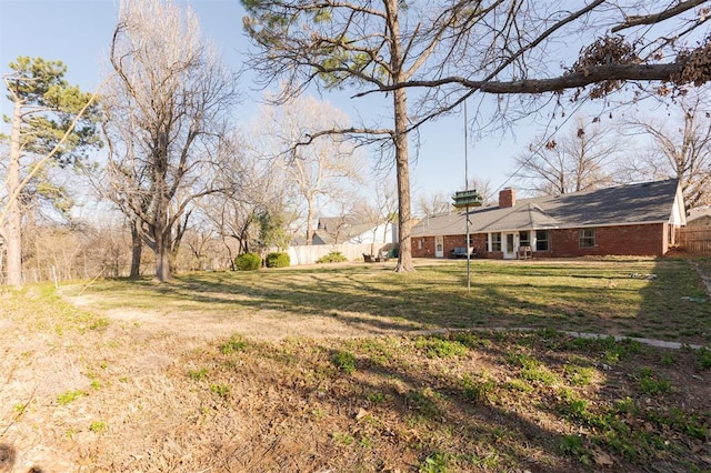 view of yard with fence