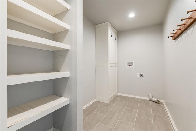 clothes washing area featuring washer hookup, recessed lighting, baseboards, hookup for an electric dryer, and laundry area