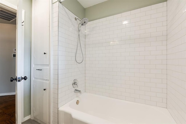 full bath with visible vents and bathtub / shower combination