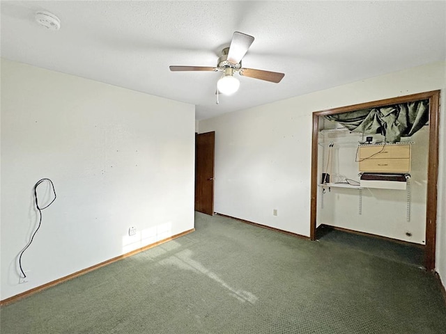 unfurnished bedroom with a ceiling fan, a textured ceiling, a closet, carpet floors, and baseboards