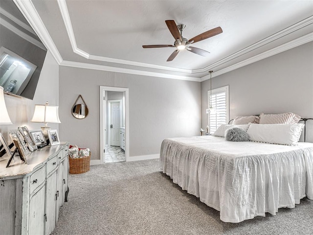 bedroom featuring light carpet, a raised ceiling, crown molding, and baseboards