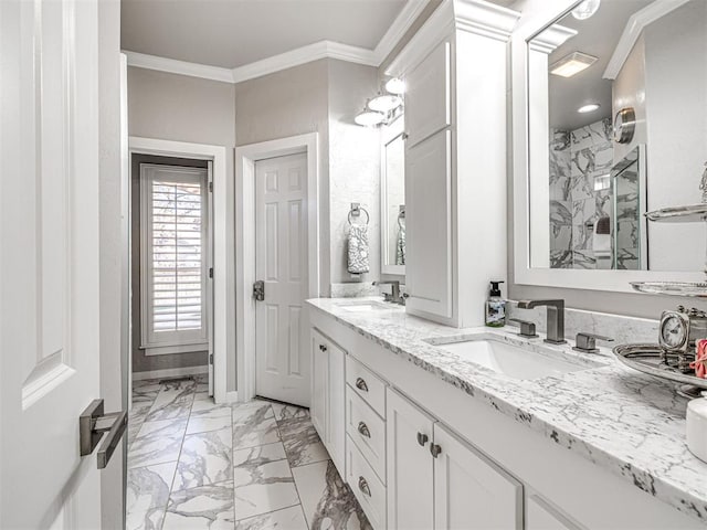 bathroom with crown molding, marble finish floor, a marble finish shower, and a sink