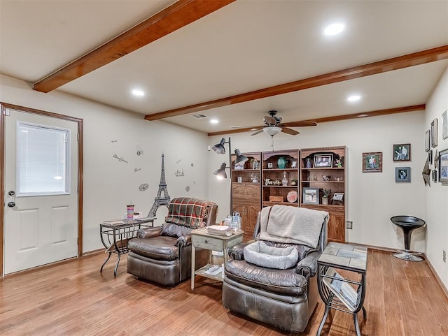 living area with recessed lighting, beam ceiling, light wood-style flooring, and a ceiling fan