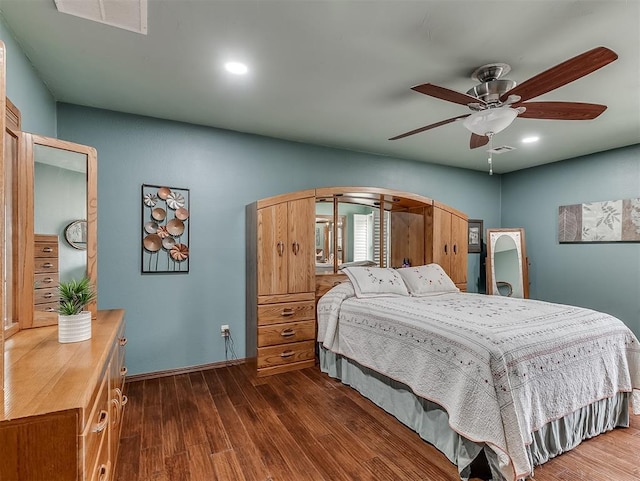 bedroom with a ceiling fan, recessed lighting, wood finished floors, and visible vents