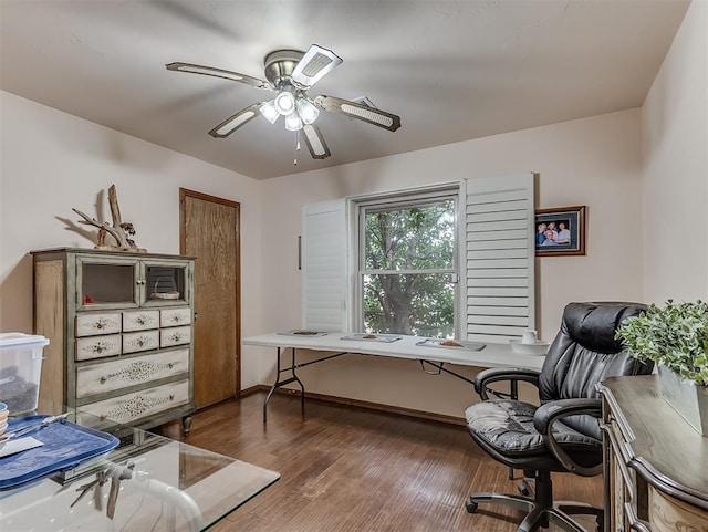 office space with ceiling fan, baseboards, and wood finished floors