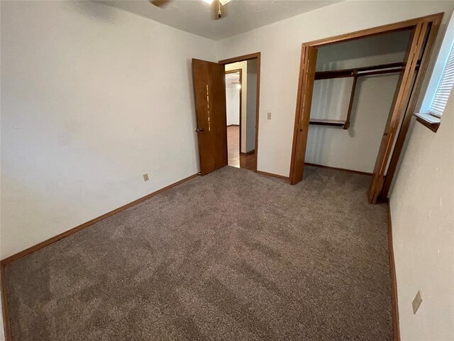 unfurnished bedroom featuring a closet, carpet flooring, and baseboards