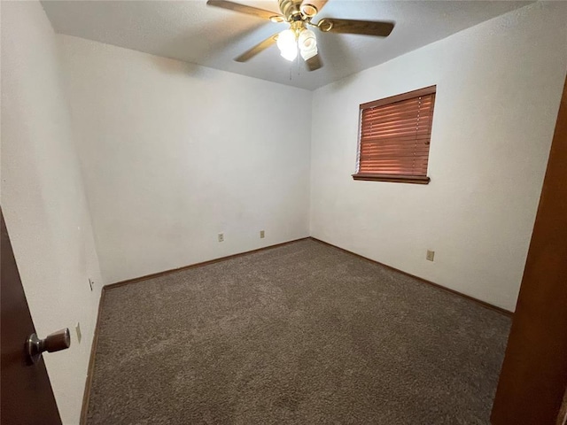 unfurnished room featuring baseboards, ceiling fan, and carpet flooring