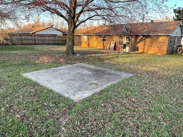 view of yard with a patio area and fence