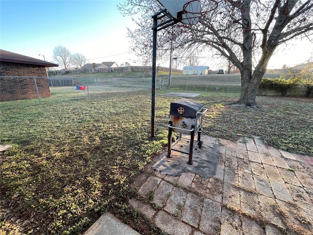 view of yard featuring a patio and fence