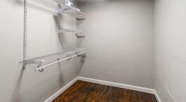 spacious closet featuring hardwood / wood-style floors