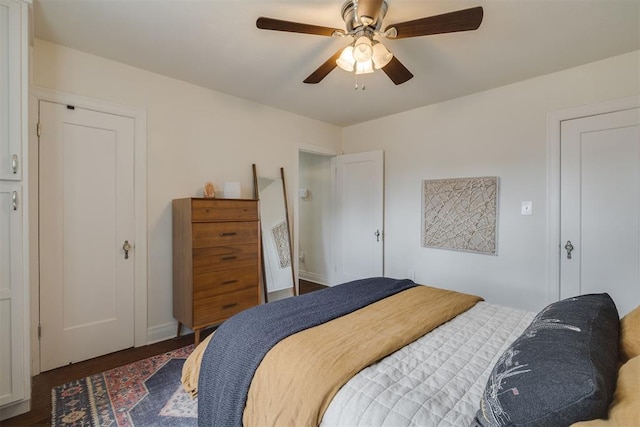 bedroom with a ceiling fan and wood finished floors