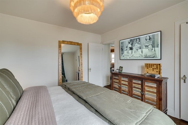 bedroom with ornamental molding