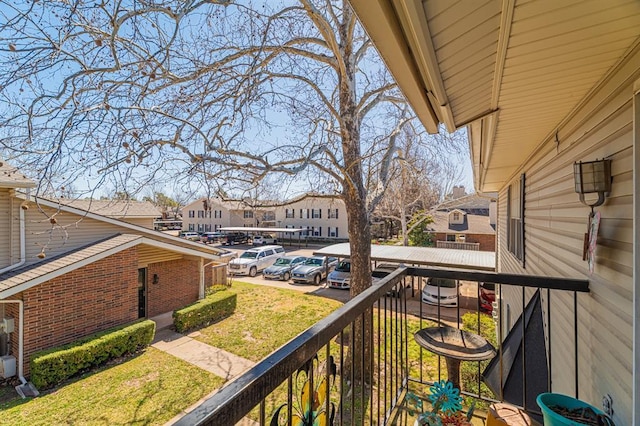 balcony featuring a residential view