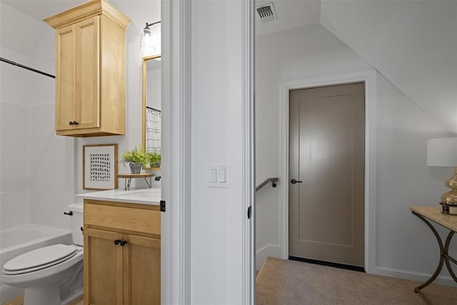 full bath featuring vanity, visible vents, tub / shower combination, vaulted ceiling, and toilet