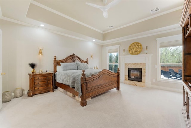 bedroom with crown molding, multiple windows, and carpet floors