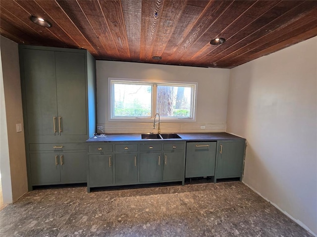 kitchen with a sink, dark countertops, stainless steel dishwasher, and wooden ceiling