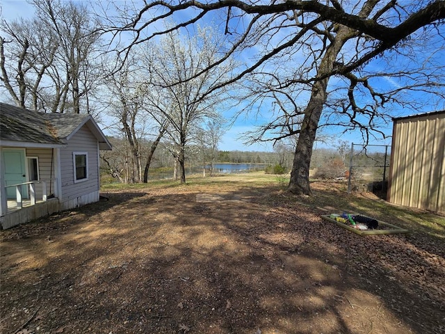 view of yard featuring a water view