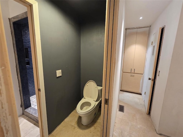 801 NE Ave C, Idabel, OK 74745 - bathroom with toilet and recessed lighting