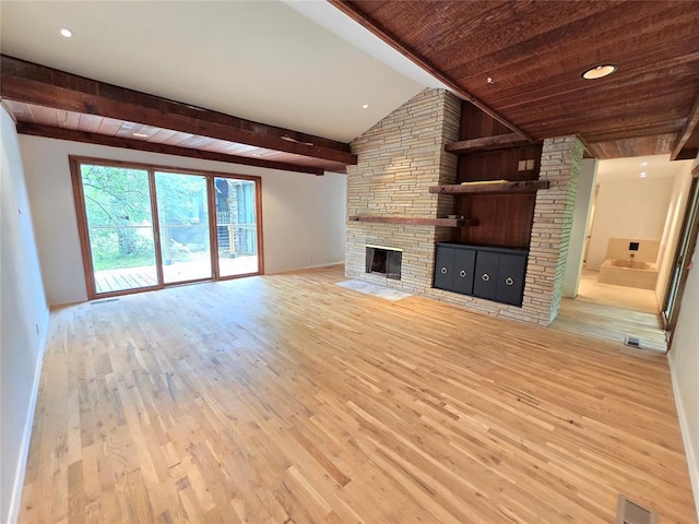 801 NE Ave C, Idabel, OK 74745 - unfurnished living room featuring wood finished floors, a fireplace, recessed lighting, and wooden ceiling