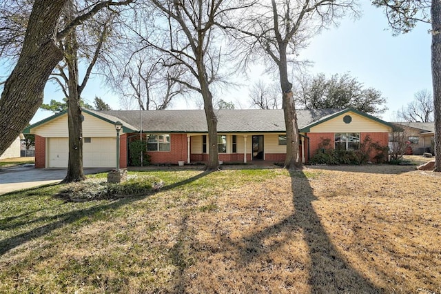 ranch-style house featuring concrete driveway, a garage, brick siding, and a front yard