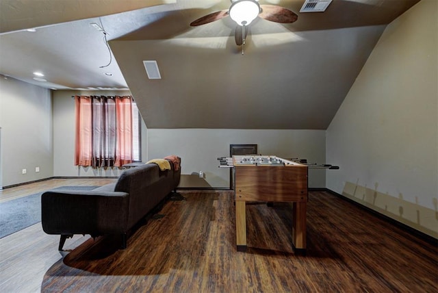 recreation room featuring visible vents, lofted ceiling, ceiling fan, and wood finished floors