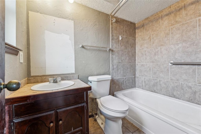 full bath with vanity, a textured ceiling, toilet, and a textured wall