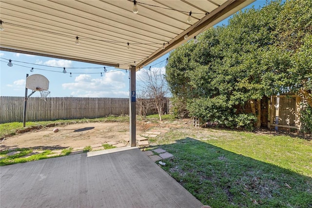 view of yard featuring a patio and a fenced backyard