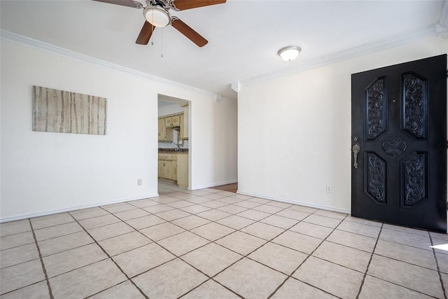 unfurnished room with ceiling fan, light tile patterned flooring, baseboards, and ornamental molding