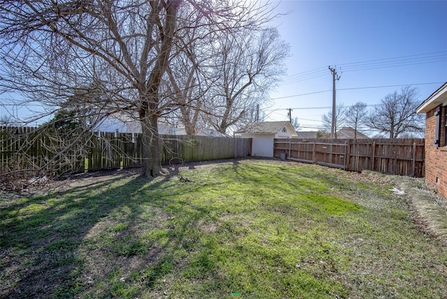 view of yard featuring a fenced backyard