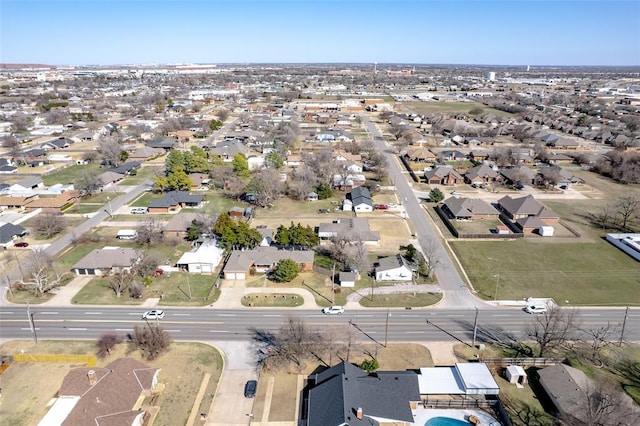 birds eye view of property with a residential view