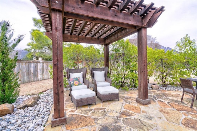 view of patio / terrace with a pergola and fence