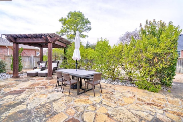 view of patio featuring outdoor dining area, a pergola, and fence