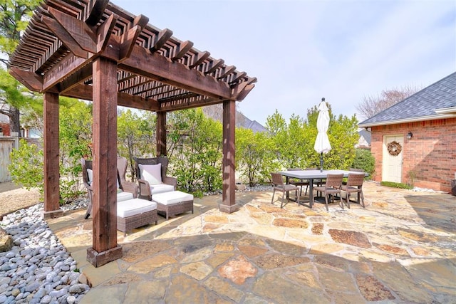 view of patio / terrace with outdoor dining area and a pergola