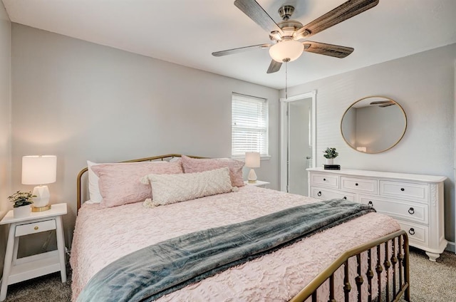 bedroom with carpet flooring, a ceiling fan, and baseboards