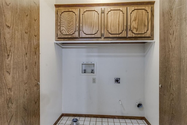 laundry area featuring washer hookup, cabinet space, baseboards, and electric dryer hookup