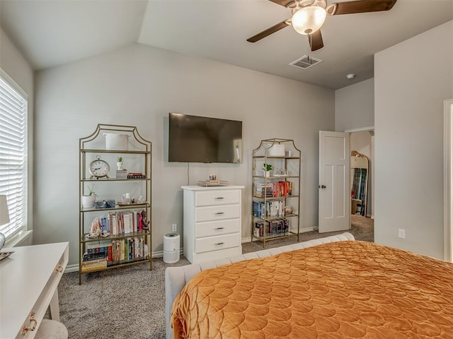 bedroom with a ceiling fan, lofted ceiling, light colored carpet, and visible vents