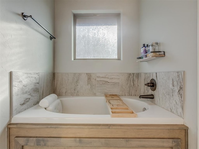 bathroom featuring a garden tub