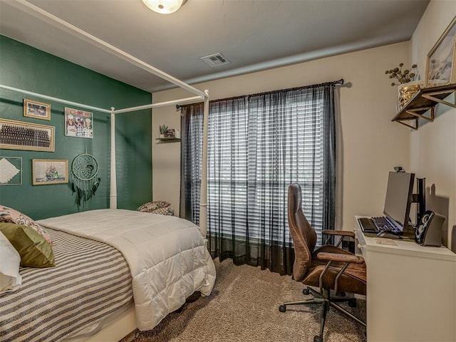 carpeted bedroom with visible vents