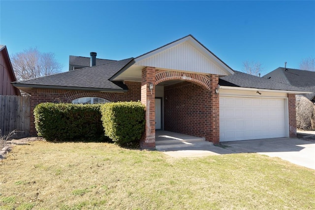 single story home featuring brick siding, driveway, a front lawn, and a garage