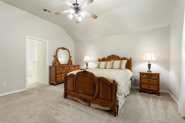 bedroom with lofted ceiling, baseboards, visible vents, and light carpet