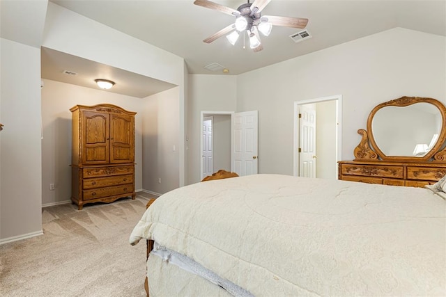 bedroom with visible vents, baseboards, light colored carpet, vaulted ceiling, and a ceiling fan