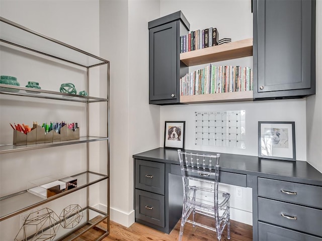 office space with wood finished floors