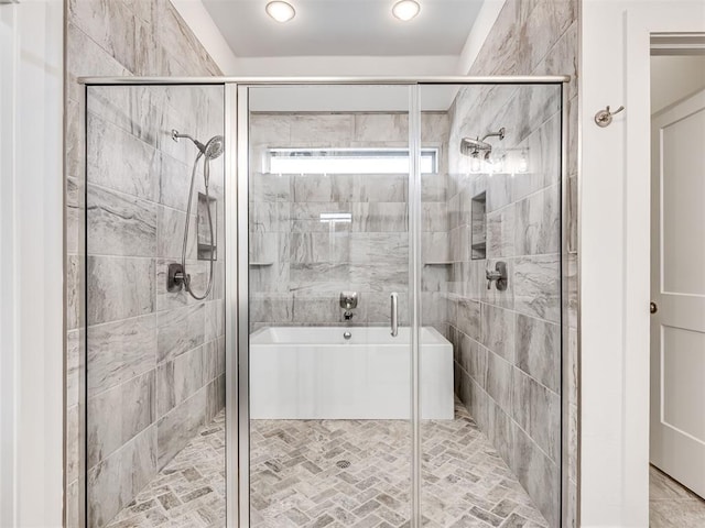 full bathroom with a stall shower