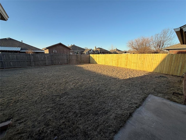 view of yard featuring a fenced backyard