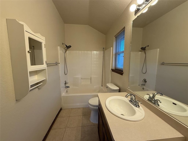 full bathroom with tile patterned flooring, shower / washtub combination, toilet, lofted ceiling, and vanity