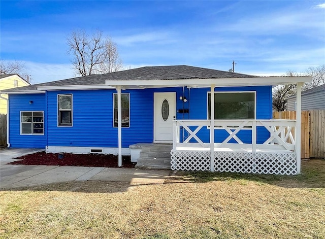 3128 Cashion Pl, Oklahoma City, OK 73112 - view of front of property with covered porch, roof with shingles, crawl space, and fence