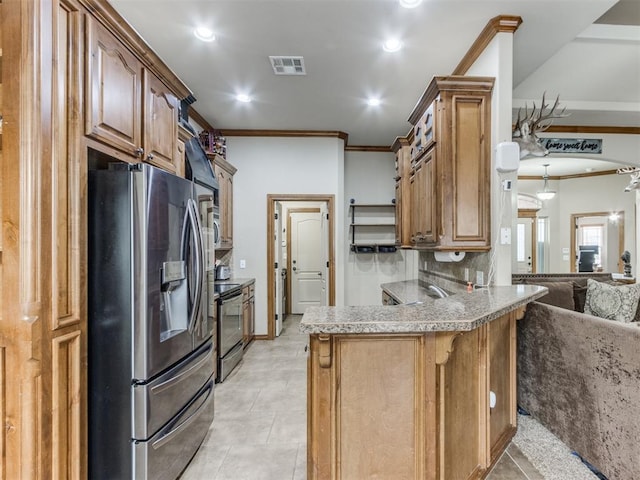 kitchen featuring visible vents, a kitchen bar, ornamental molding, a peninsula, and stainless steel appliances