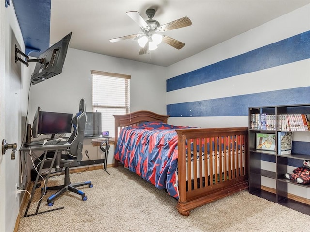 bedroom featuring baseboards, a ceiling fan, and carpet flooring